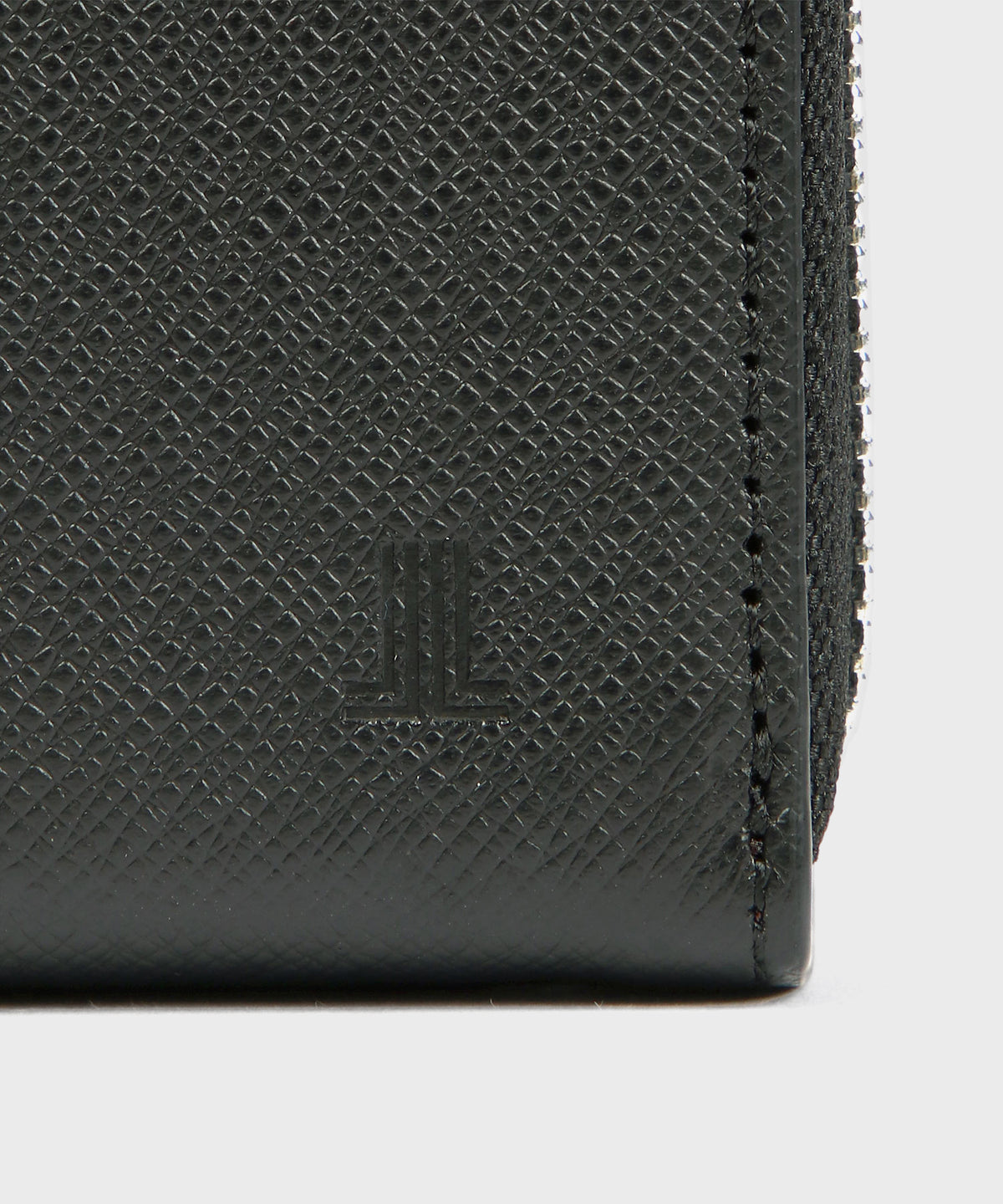 EMBOSSED LEATHER ROUND ZIP